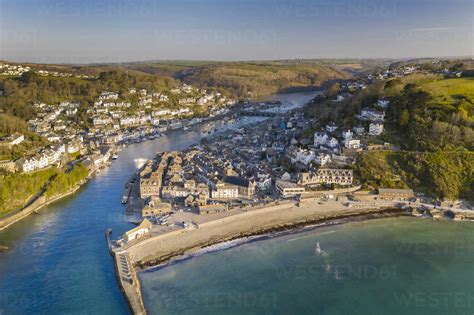 Aerial View Of The Beautiful Cornish Fishing Town Of Looe On A Sunny