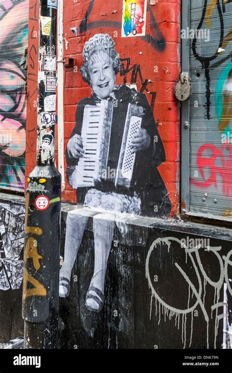 Street Artist Art Paste Up Queen Elizabeth Ll Playing An Accordion