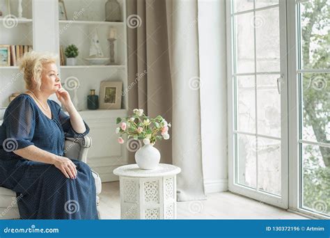 Senior Woman Sitting On The Armchair Stock Photo Image Of Grandmother
