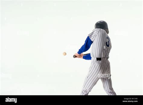 Baseball Player Hitting Ball Stock Photo Alamy