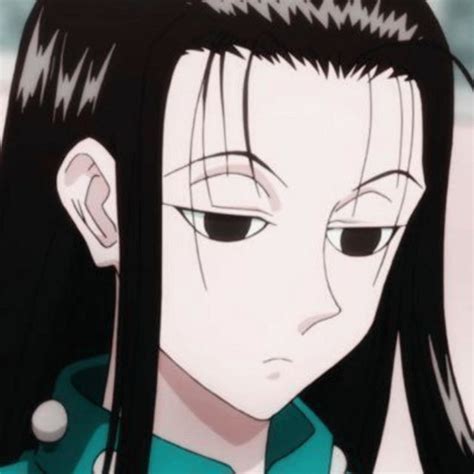 An Anime Character With Long Black Hair And Piercings On Her Ears