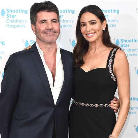 simon cowell is engaged to lauren silverman after 13 years together