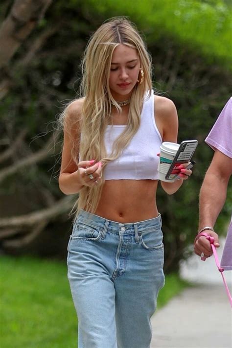 Delilah Hamlin Flaunts Her Toned Midriff In A White Crop Top While Out