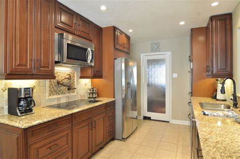 Pot filler kitchen faucets : Pot filler at the cooktop | Kitchen remodel, Kitchen