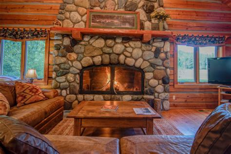 Rustic chandelier stone fireplace and high ceiling with wooden. Cabin Fireplace - Room Pictures & All About Home Design ...