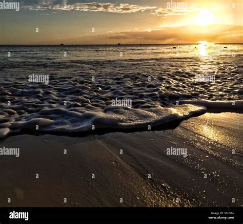 Sunset On The Beach Stock Photo Alamy