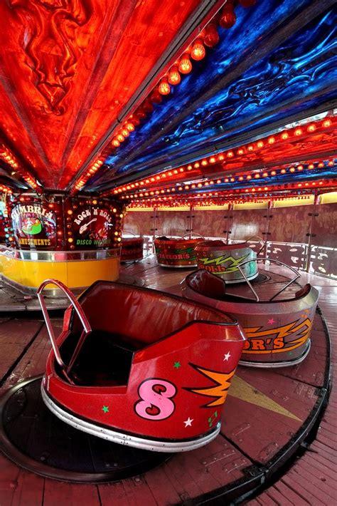 an amusement park filled with lots of colorful rides