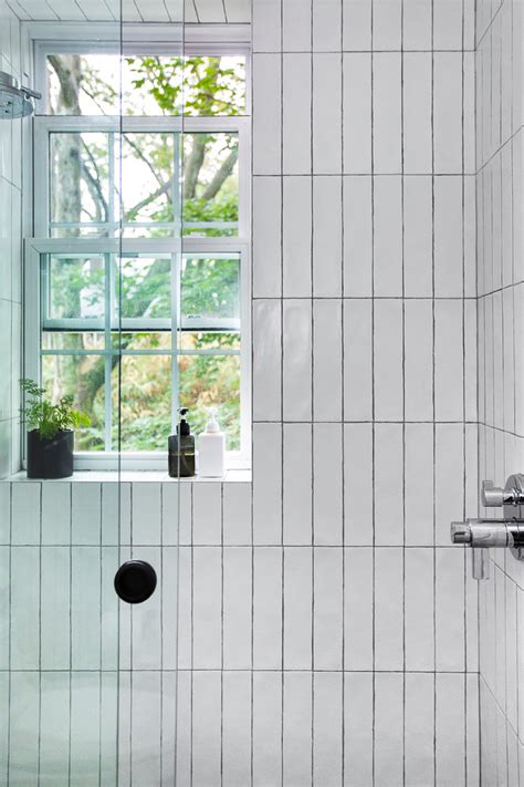 Glass Enclosed Shower With Vertically Stacked Subway Tile Modern