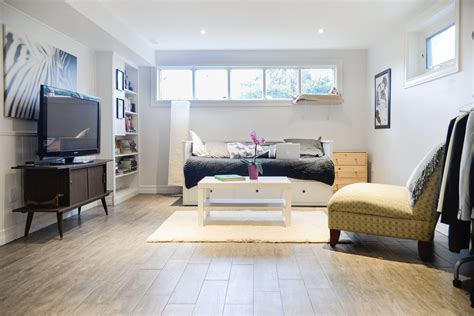 A Simple, Minimal & Surprisingly Airy Basement Studio Apartment