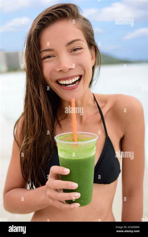 Green Smoothie Detox Drink Smiling Asian Woman Drinking Vegetable Juice On Beach Bikini Happy