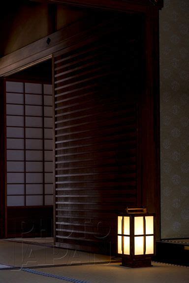 Japan Traditional Floor Lantern In Tatami Mat Room With Shoji Screen