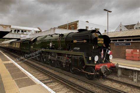 He accepted the golden arrow and held it above his head. Peter Kesby Photography | Golden Arrow 35028 Clan Line #1 ...