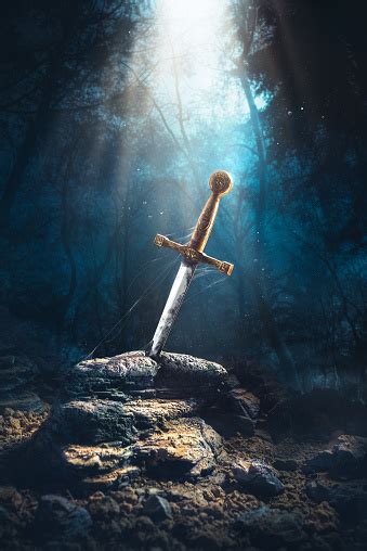 As we watched the film, there was little doubt that we were witnessing the rise of a superstar. Sword In The Stone Excalibur Stock Photo - Download Image ...
