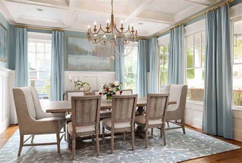 Pastel Blue Walls And Curtains A Wooden Table With Six Upholstered