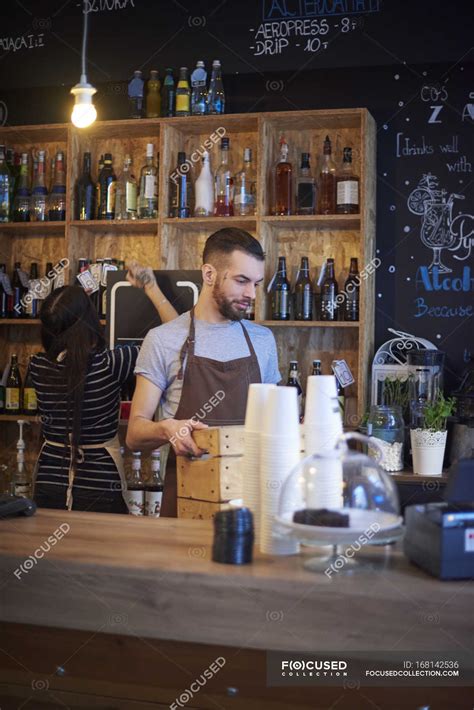 Baristas Working Behind Counter In Coffee Shop — Style Young Man