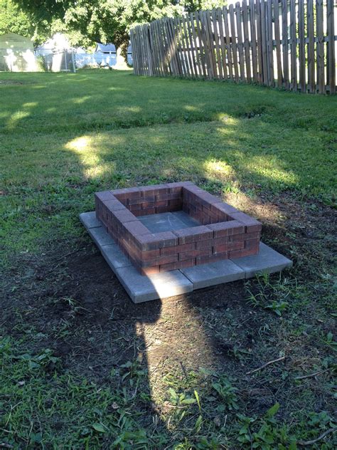 Diy Brick Fire Pit Under 50 From 12x12 Gray Cement Pavers And 3x8 Red