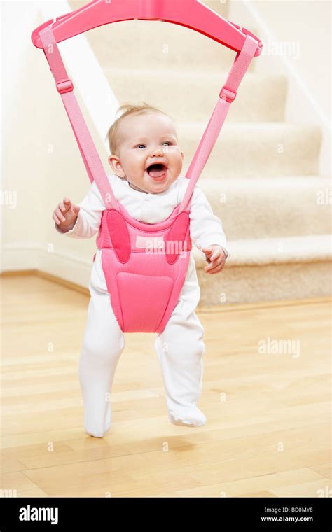 Baby In Bouncer Stock Photo Alamy