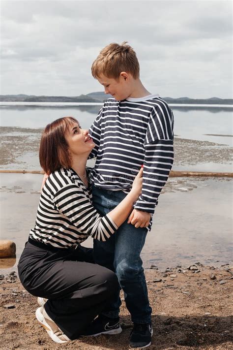 Mom Hugs Her Son On The Riverbank Stock Image Image Of Happy Cute
