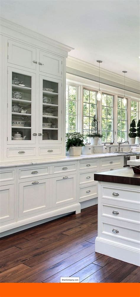 Entirely white kitchens made with everything from white cabinets to white countertops are increasingly popular. White Kitchen Cabinets With Copper Hardware and Pics of ...