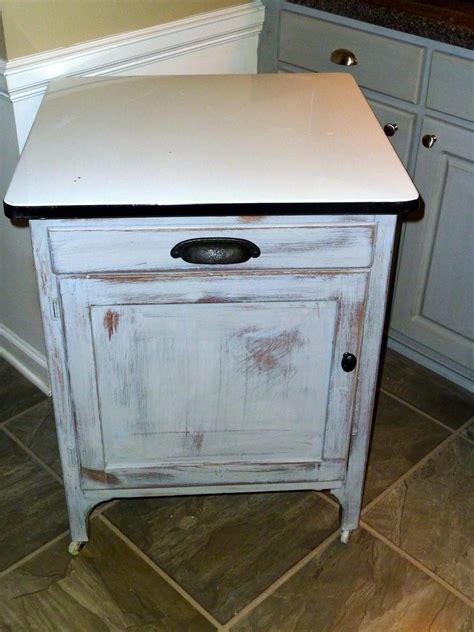 Distressed kitchen cabinets are far from a damsel in distress. annie sloan paris grey kitchen cabinets distressed ...