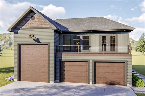 A Two Story House With Three Garages On The Second Floor