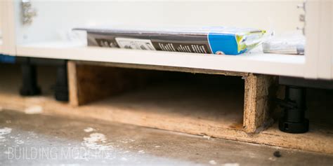 How does ducted heating work? Redirecting a vent register under a cabinet
