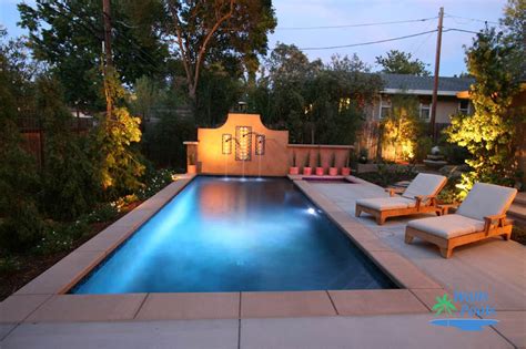 A tiny backyard with desert plants and a narrow pool to avoid heat. Small Pool Construction, Sacramento, Folsom, El Dorado ...