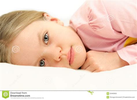 A Little Girl Lying In Bed With Open Eyes Stock Photos Image 29460903