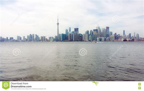 Toronto Skyline With Cloudy Sky At Dusk Ontario Canada Editorial