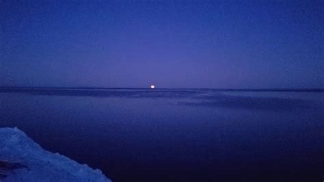 The Full Moon Rising Over Lake Superior Youtube