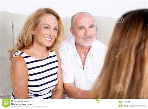 Parents Listening To Daughter Stock Photo Image Of Plan Smiling