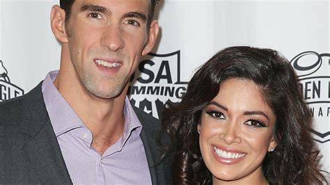 how did michael phelps and nicole johnson meet the two have been together longer than you think
