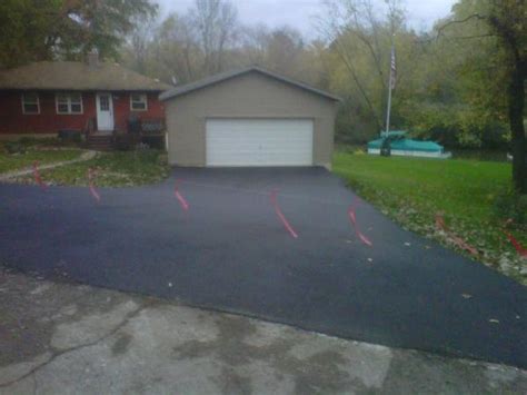 Before you start, check the weather forecast to make sure the temperature will be above 60 degrees fahrenheit with no rain at all after you're done, refrain from walking on the driveway for the next few days so the asphalt can set. Driveway Silt Runoff - DoItYourself.com Community Forums