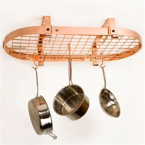 The beautiful, steel rack weighs 29 pounds, and it holds many times its weight in cookware. Enclume Low Ceiling Oval Pot Rack - Copper | Pot rack, Pot ...