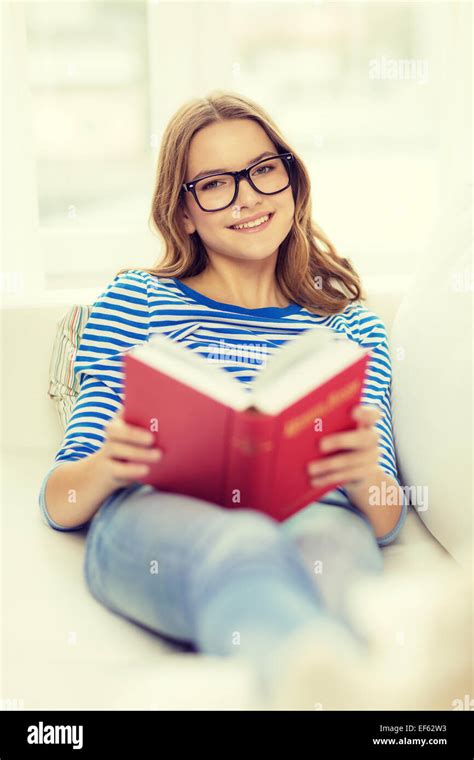 Teenager Reading Book Couch Hi Res Stock Photography And Images Alamy