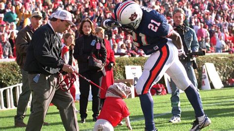 Dawg Almost Bites Man Inside An Enduring Image From Georgia Auburn