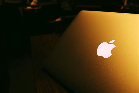 Macbook Pro At Night With Apple Logo Image Free Stock Photo Public