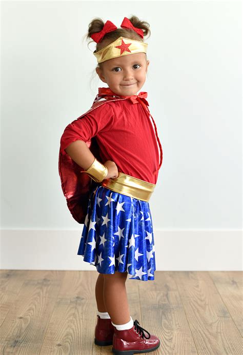 Fold the corset in half and trace a jagged design like the front of wonder woman's corset piece ontp the red foam (check out the reference photo below). Wonder Woman Costume Pattern for Kids - Crazy Little Projects