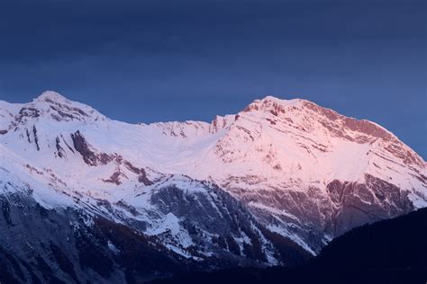 Snow Capped Mountain Ridge Photo Free Switzerland Image On Unsplash