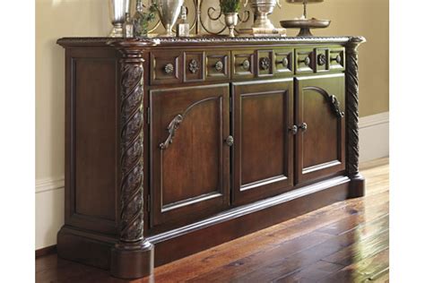 Description the charmond dining room buffet's uniquely luxurious interpretation of traditional style says it all. North Shore Dining Room Buffet | Ashley Furniture HomeStore