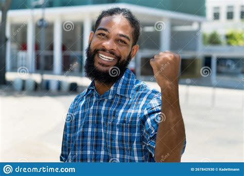 Successful Cheering African American Man With Beard Stock Photo Image