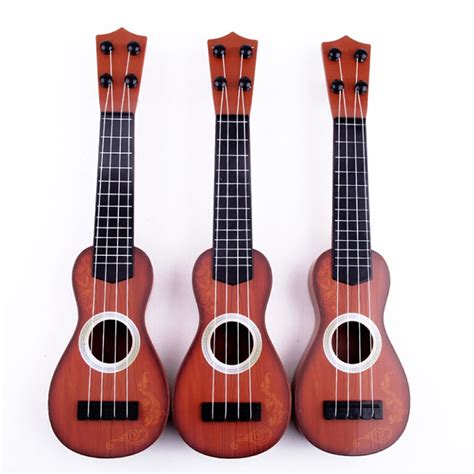 Hawaiian Instrument String Guitar Plastic Ukulele Beginner T 359