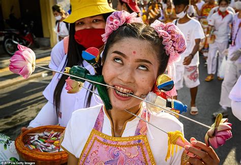 Devotees Pierce Their Faces With Swords And Skewers During Extremely