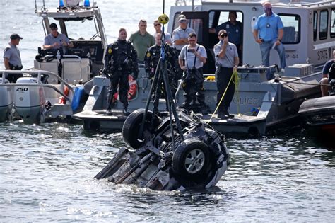 Police Release Ids Of Pair Found In Submerged Car In Boston