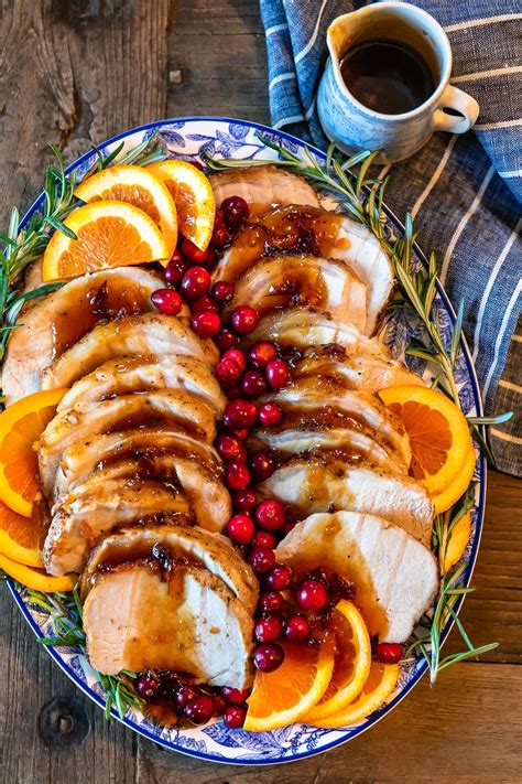 Sides of fresh colorful vegetables, bean, red pepper, yellow. This Orange Cranberry Pork Loin Roast recipe is the ...