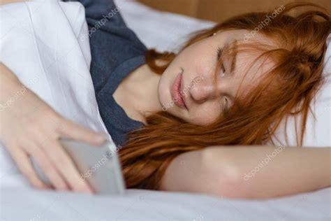 Redhead Woman Sleeping In The Bed Stock Photo By Vadymvdrobot