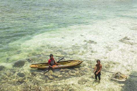 Unidentified Bajau Laut Kids On A Boat In Maiga Island Editorial Stock