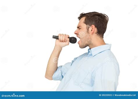 Side View Of A Young Man Singing Into Microphone Stock Photo Image