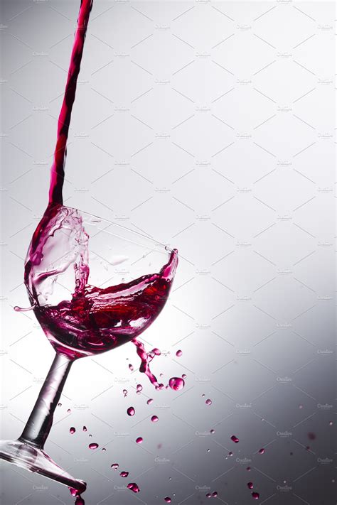 Wine Pouring Into A Glass Featuring Wine Glasses And Glass Food Images ~ Creative Market