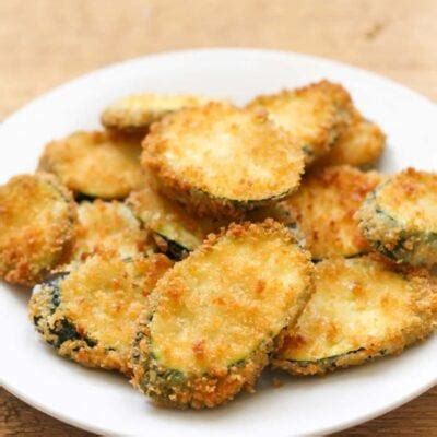Place the breaded zucchini sticks in a single layer on the prepared baking sheets and spray with more oil on top. Fried Zucchini Recipe - How To Fry Zucchini (+VIDEO) | Lil ...